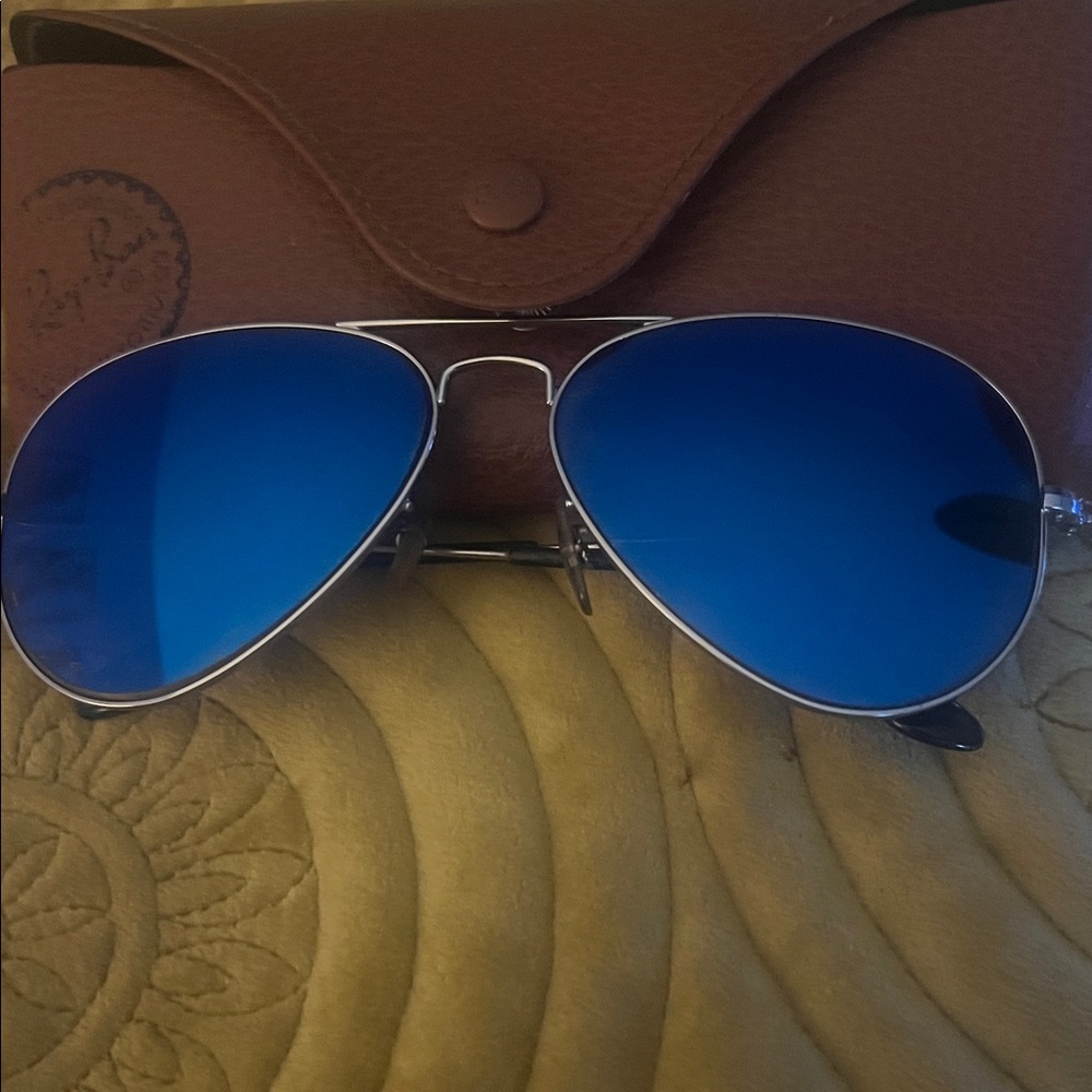 Ray-Ban Aviator Sunglasses with Vibrant Blue Lenses